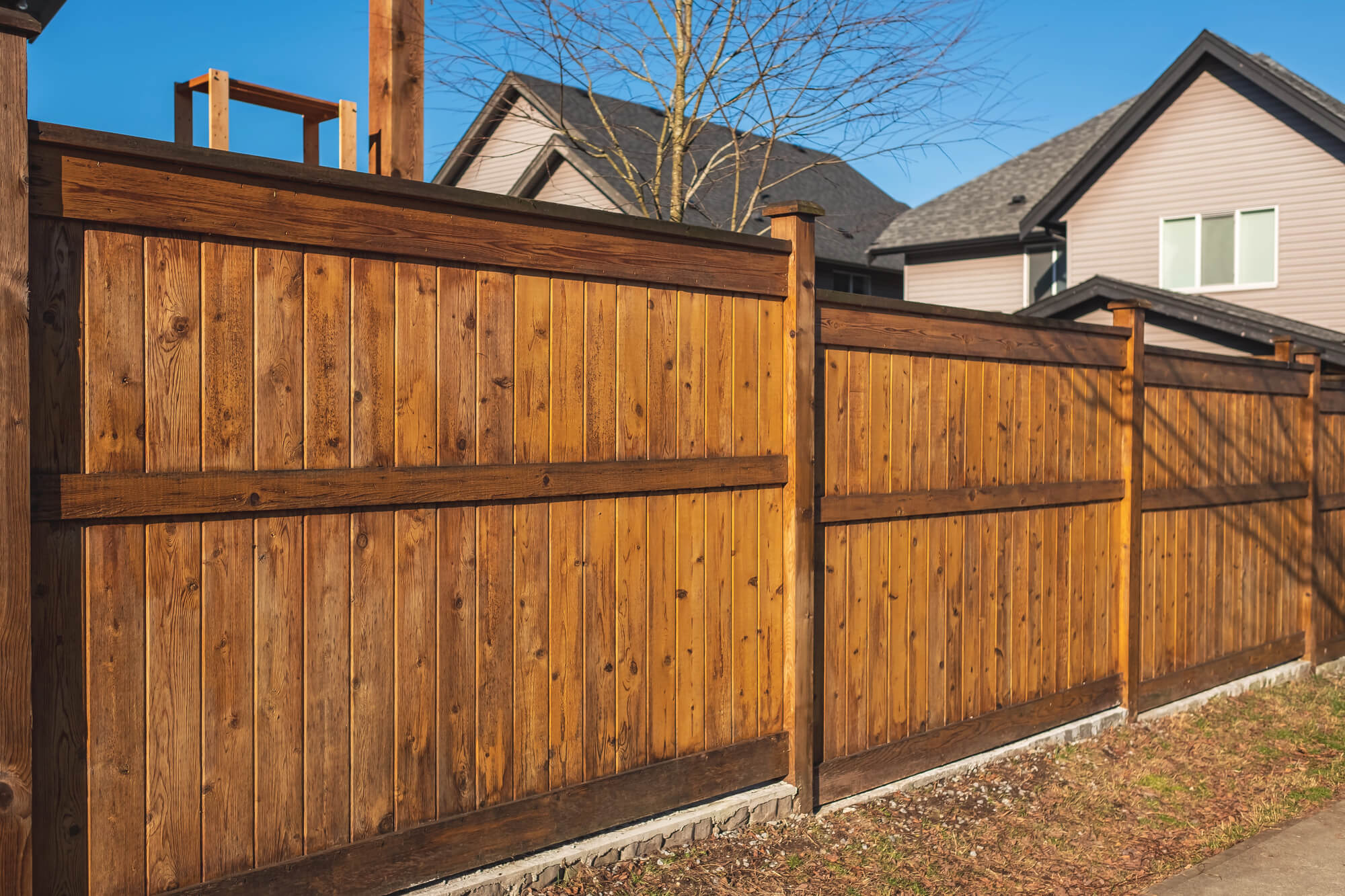 Warm cedar fence with natural grain for a Cary residence