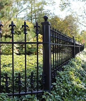 Wrought iron fence installation